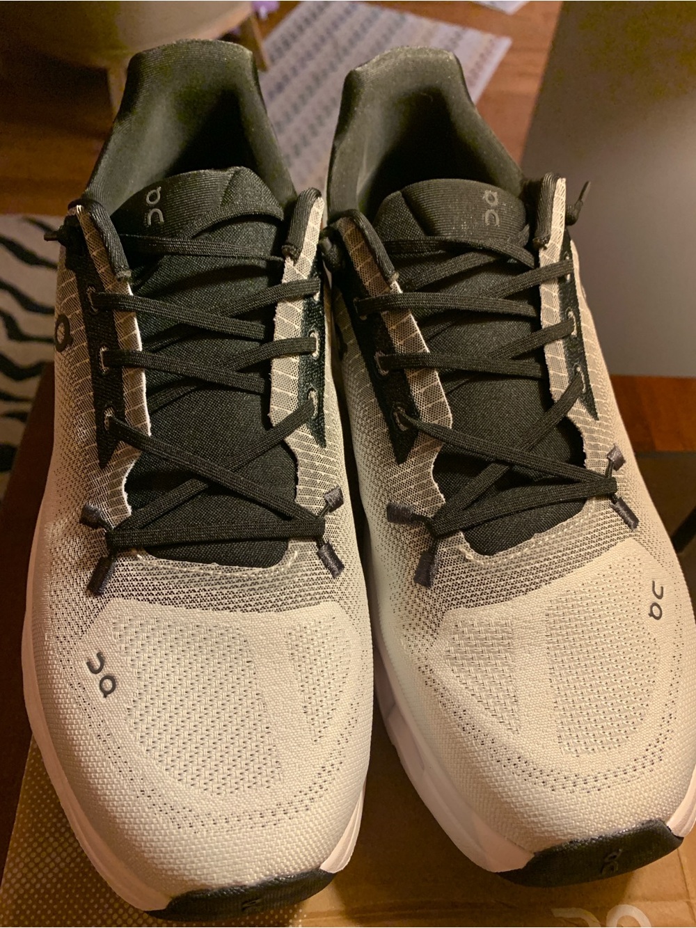 On Running Women's White and Black Knit Athletic Shoes